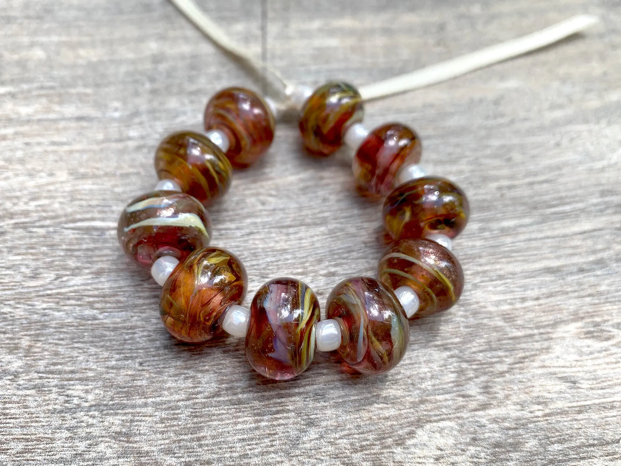 10 Ruby Brown Swirls Lampwork Beads SRA