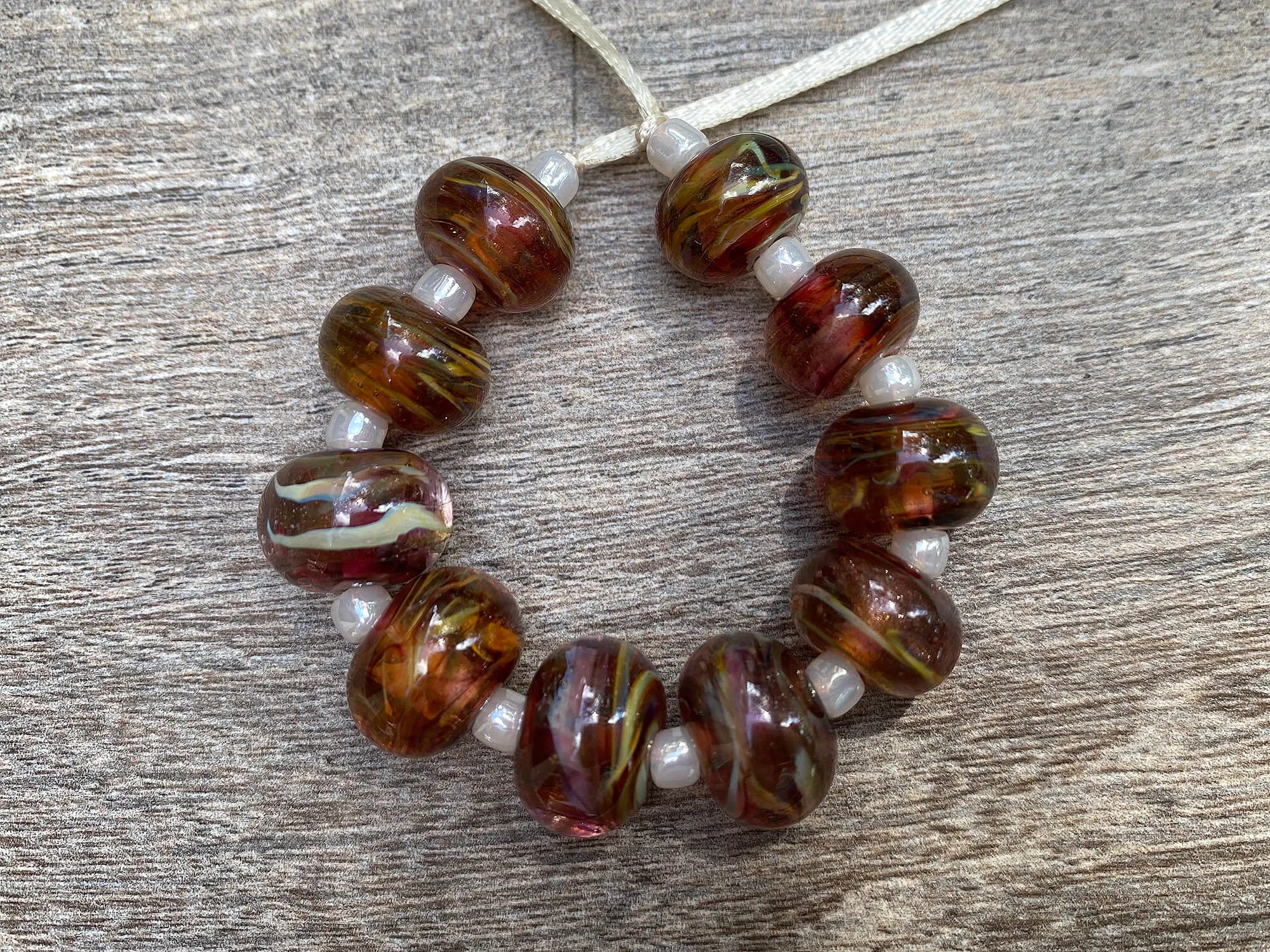 10 Ruby Brown Swirls Lampwork Beads SRA