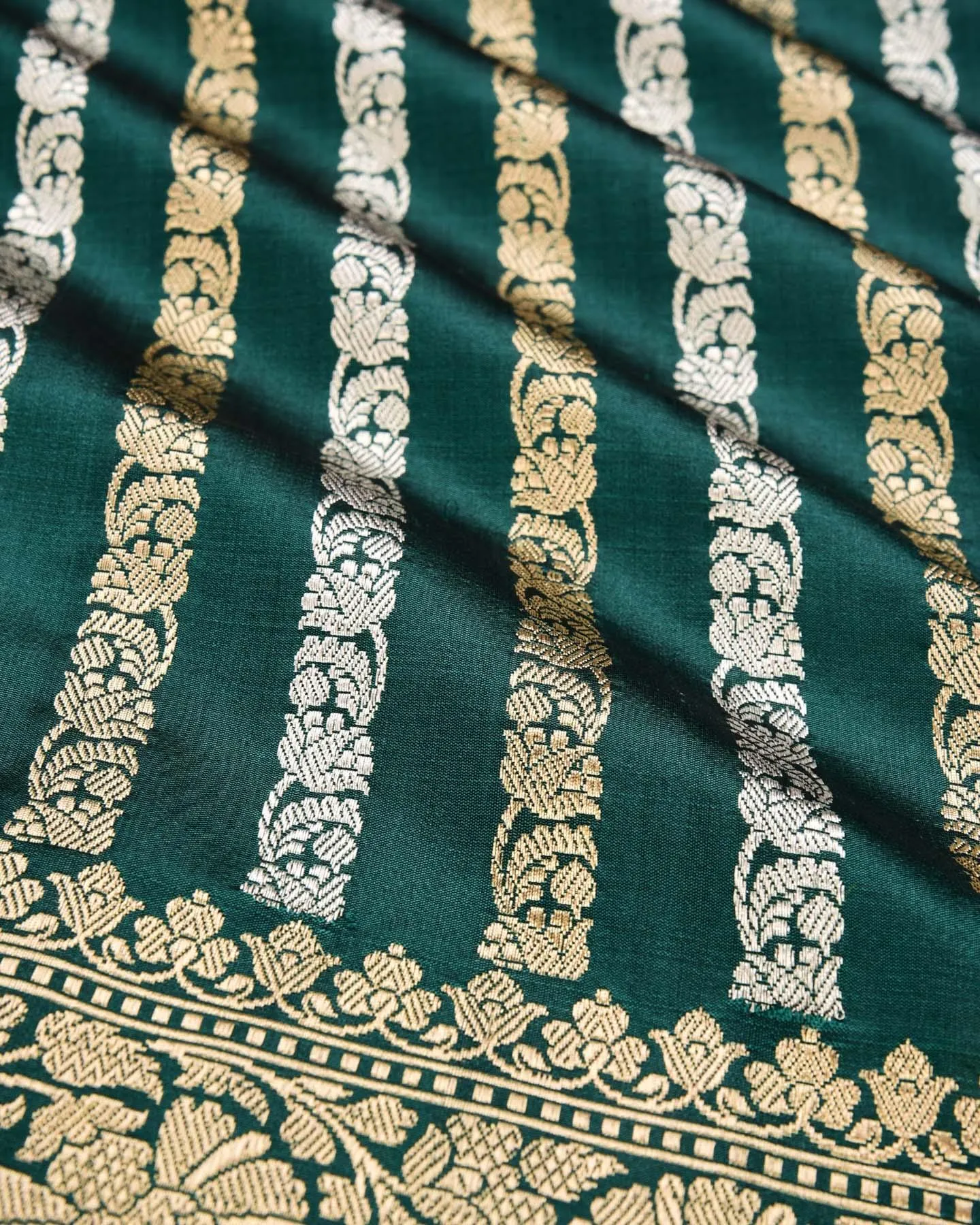 Bottle Green Banarasi Inlaid Stripes Gold and Silver Zari Kadhuan Brocade Handwoven Katan Silk Saree
