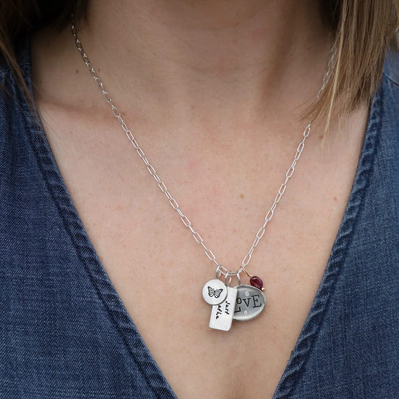 Ruby Unfaceted Oval Gemstone Charm